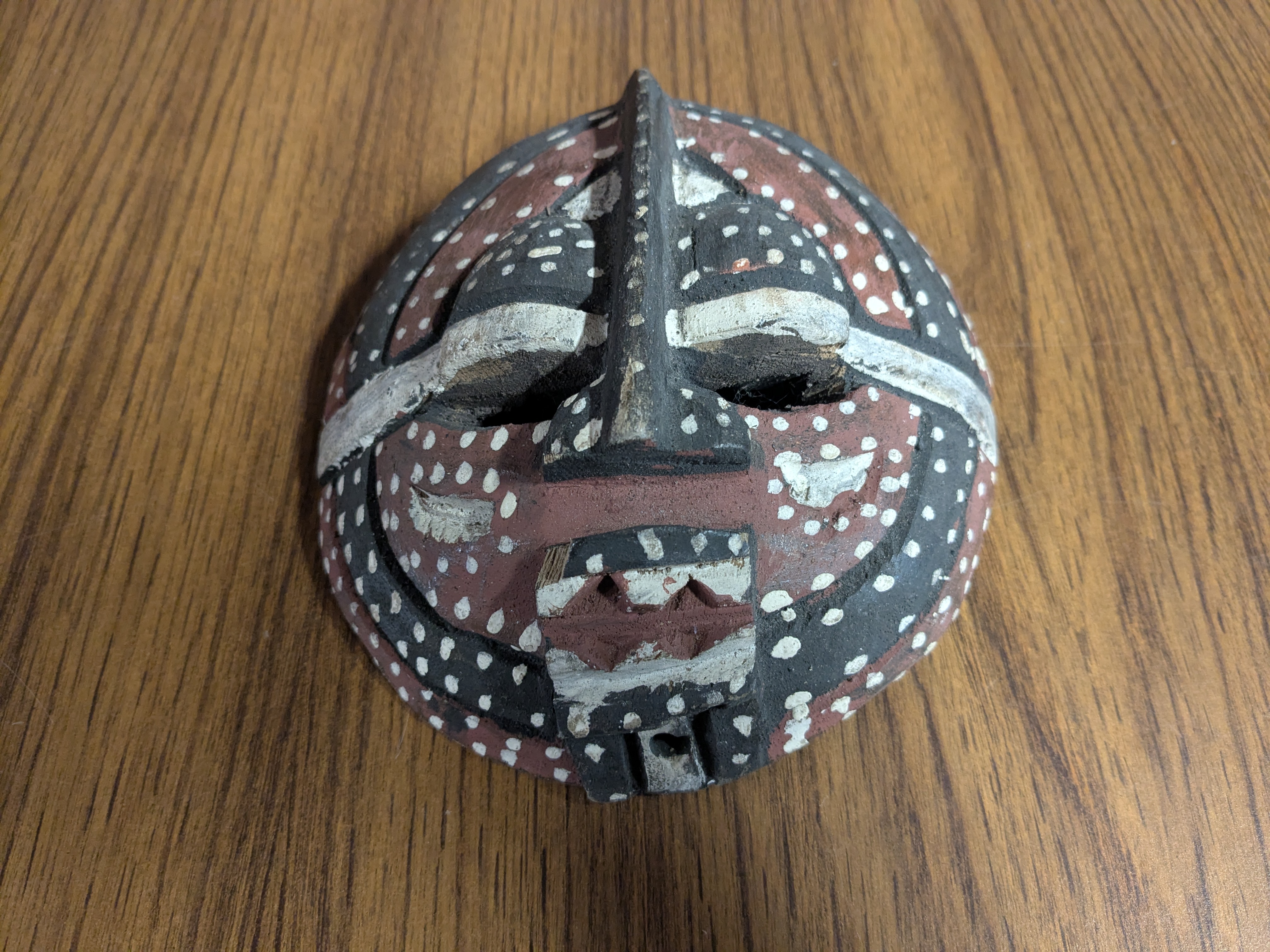 Small Hand-Carved African Mask, white-dotted motif. Probably Congolese.